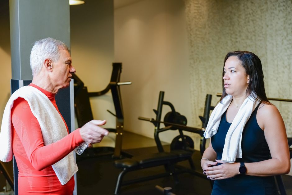 Senior checking into a participating SilverSneakers gym location