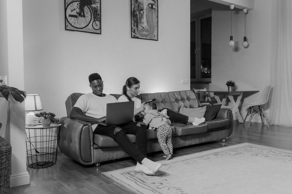 Family researching ABLE account enrollment options together on a laptop