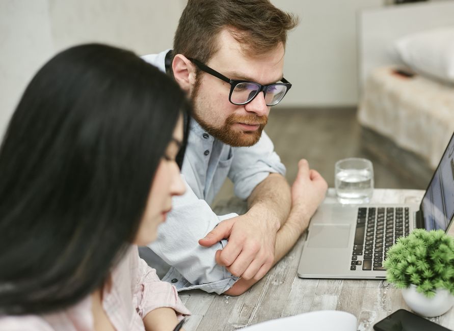 Person reviewing 2026 ACA Marketplace health insurance plans and premium costs on a laptop