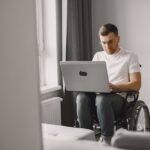 Person with a disability checking Canada Disability Benefit eligibility online