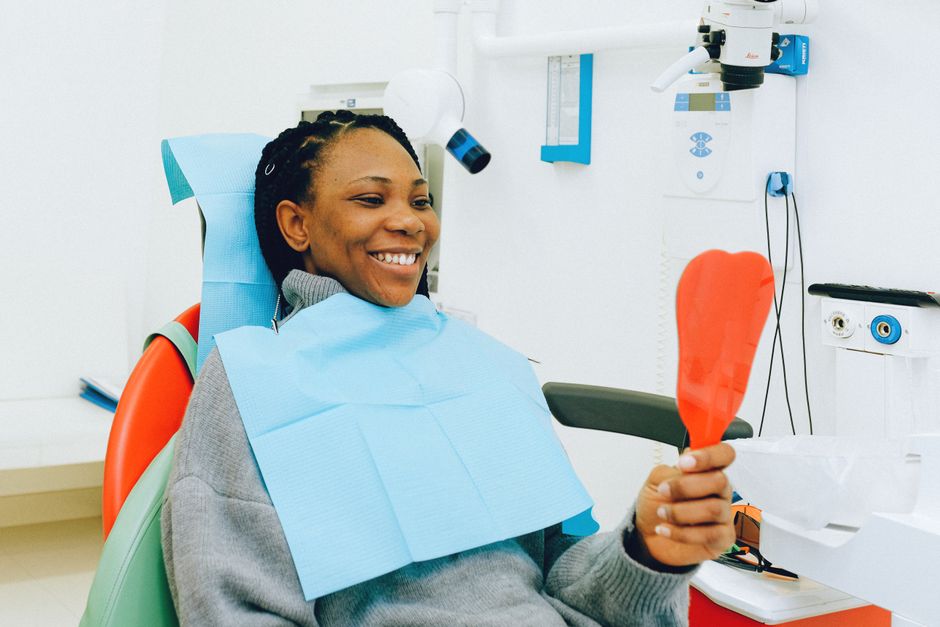 Adult patient at a dental checkup covered by the Canadian Dental Care Plan 2026