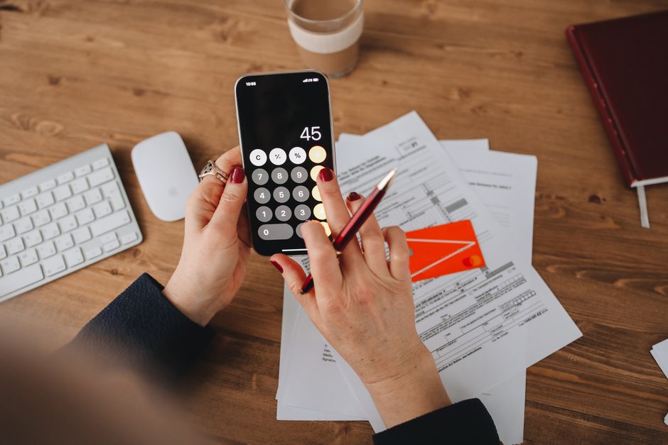 person checking tax refund status on a smartphone app