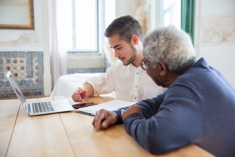Family reviewing bank account security and fraud alerts to protect retirement savings