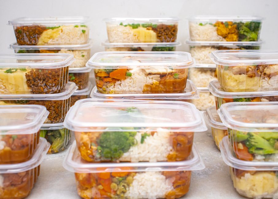 labeled and dated freezer meal prep containers for seniors on a fixed income