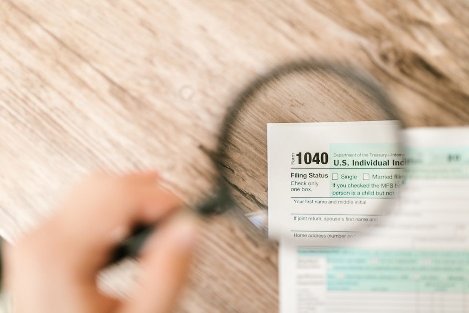 checking Schedule R tax credit eligibility figures on a tax return