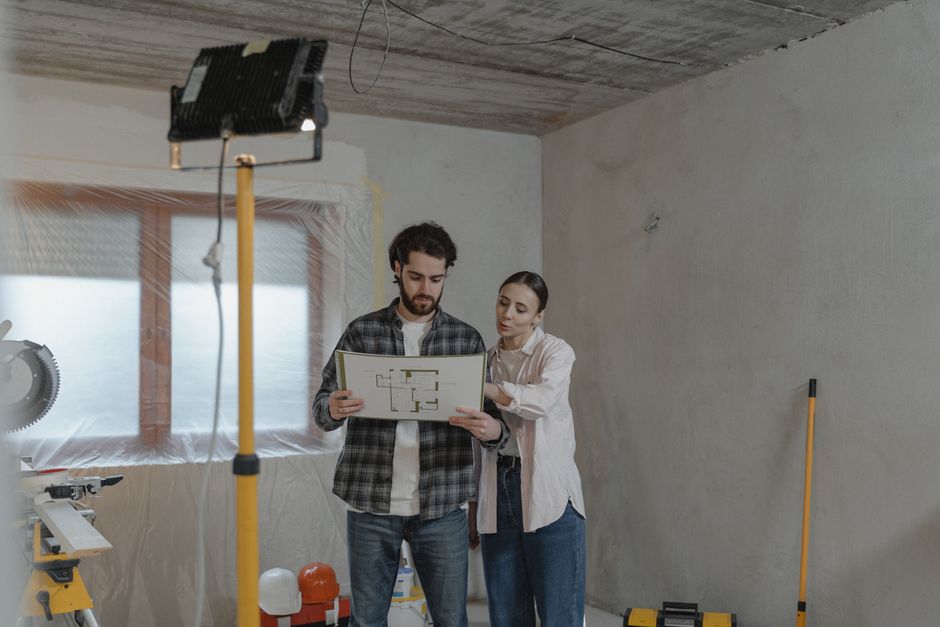 couple reviewing completed energy-efficient home upgrades before the 2026 tax filing deadline