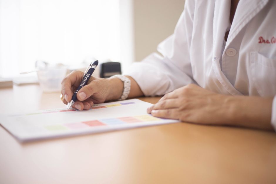 Doctor writing a medical documentation letter for a patient with a respiratory condition