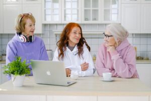 Canadian senior reviewing Allowance for the Survivor application documents