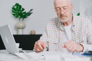 Reviewing Medicare Annual Enrollment Period paperwork and options