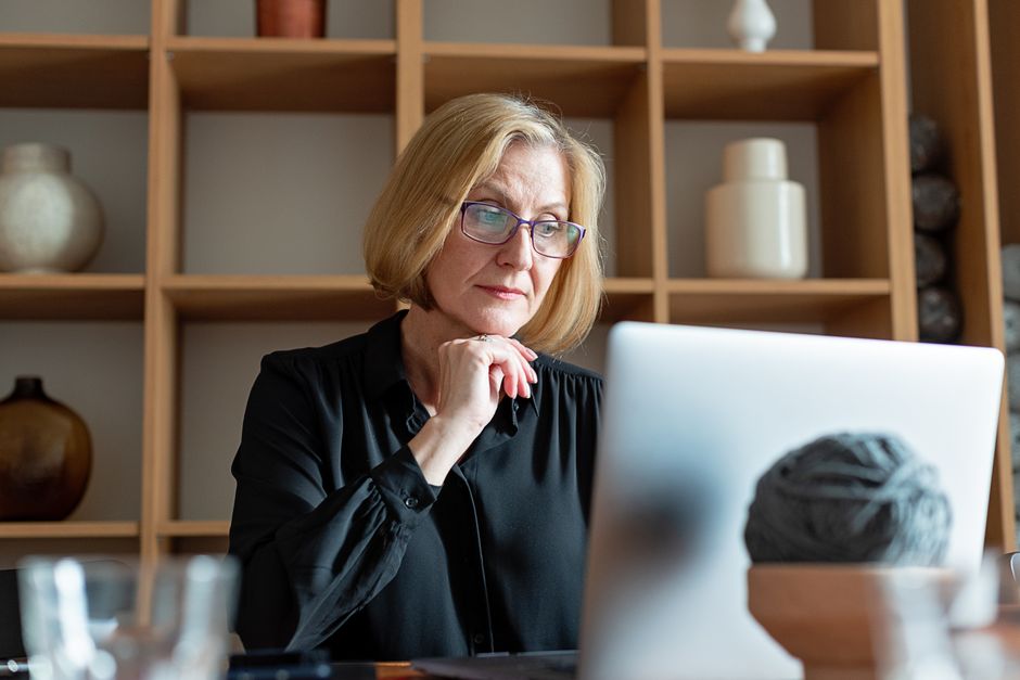 Person filling out an online property tax reimbursement application on a laptop