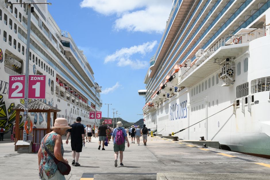 Cruise ship departure showing senior travelers using AARP cruise savings
