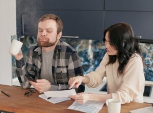 Senior Illinois homeowners reviewing property tax assessment paperwork