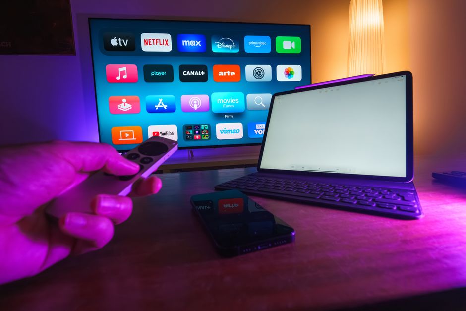 Smart TV home screen showing multiple free and paid streaming app icons