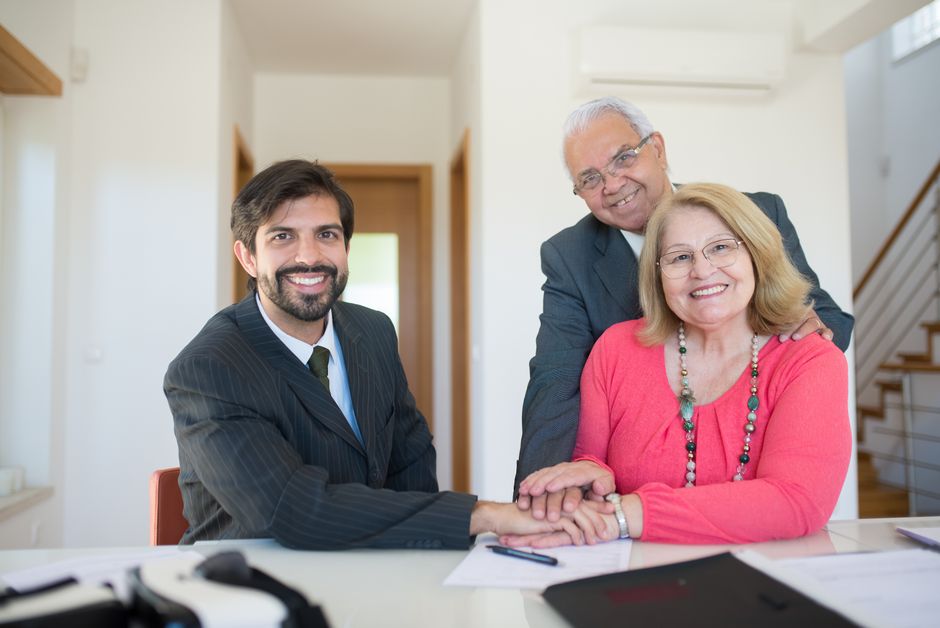 Family discussing prepaid funeral plan options with a funeral home advisor