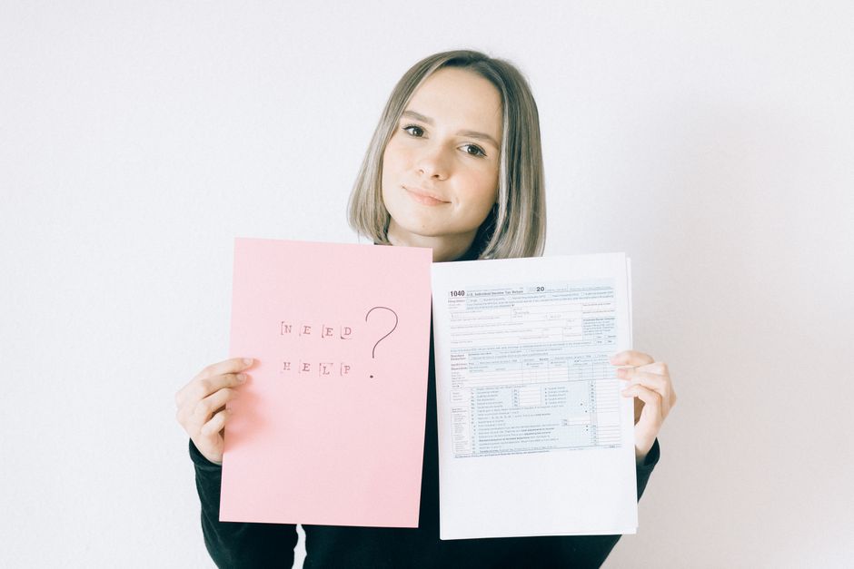 Senior receiving free tax filing help for Schedule CB at a VITA site