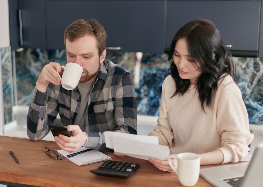Reviewing a property tax statement with a calculator