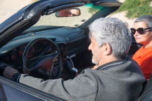 Senior couple enjoying a relaxed drive together