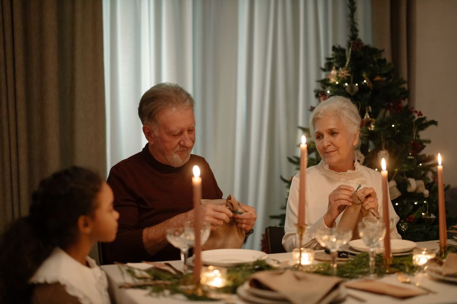 Retired couple enjoying a holiday meal together at home